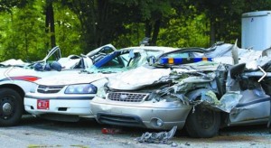 police car v tractor demolished wrecked crown victoria