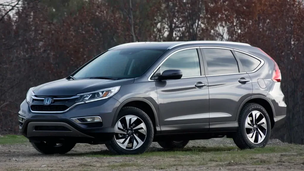 A gray Honda CR-V SUV parked outdoors, known for its reliability and spacious design, perfect for families.