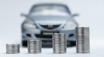 coin stacks in front of car