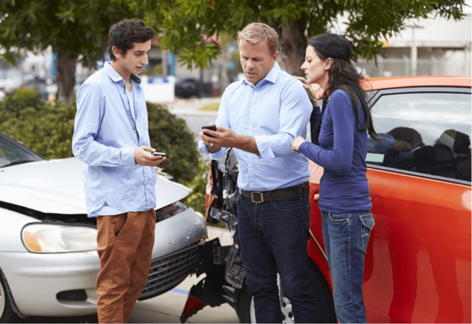 Insurance Exchange Georgia Car Accident – Diminished Value of Georgia, Car Appraisals for Insurance Claims Three drivers exchanging insurance information after a car accident in Georgia for a diminished value claim | Diminished Value of Georgia, Car Appraisals for Insurance Claims