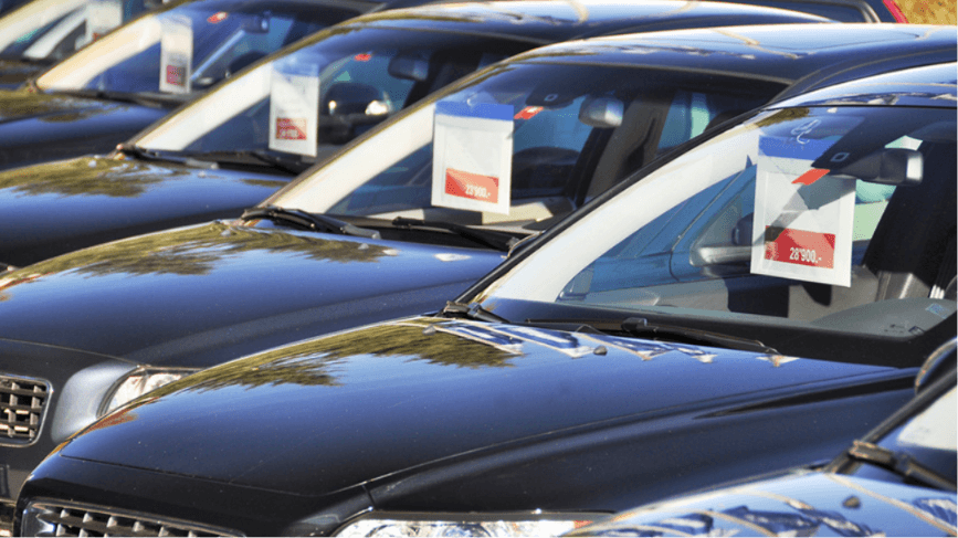 Dealership Lot Price Tags Illustrating Rising New Car Prices in 2026 – Diminished Value of Georgia, Car Appraisals for Insurance Claims Row of vehicles on a dealership lot with price tags in the windshields, illustrating rising new car prices in 2026 | Diminished Value of Georgia, Car Appraisals for Insurance Claims