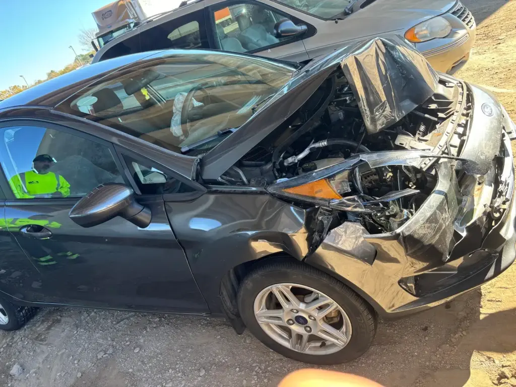 totaled vehicle waiting for the insurance payout